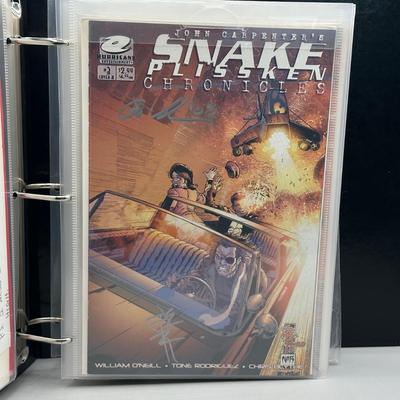LOT 45: Collection of Signed Snake Plissken Chronicles Comic Books and More