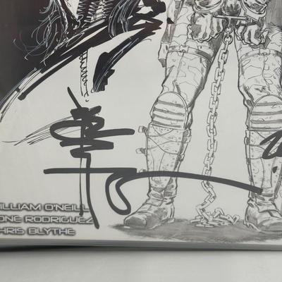 LOT 45: Collection of Signed Snake Plissken Chronicles Comic Books and More