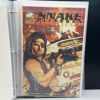 LOT 45: Collection of Signed Snake Plissken Chronicles Comic Books and More