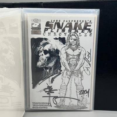 LOT 45: Collection of Signed Snake Plissken Chronicles Comic Books and More