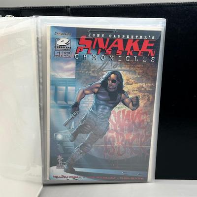 LOT 45: Collection of Signed Snake Plissken Chronicles Comic Books and More