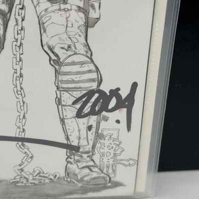 LOT 45: Collection of Signed Snake Plissken Chronicles Comic Books and More