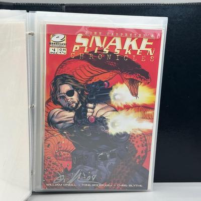 LOT 45: Collection of Signed Snake Plissken Chronicles Comic Books and More