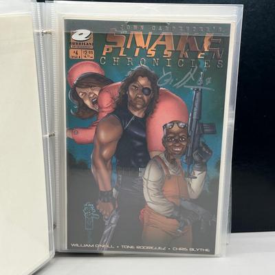 LOT 45: Collection of Signed Snake Plissken Chronicles Comic Books and More
