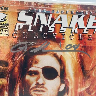 LOT 45: Collection of Signed Snake Plissken Chronicles Comic Books and More