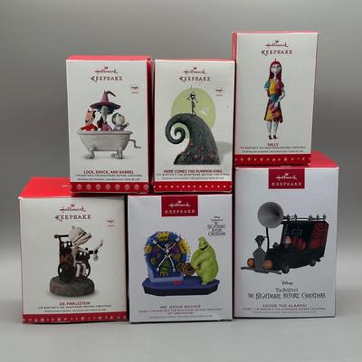 LOT 48: Hallmark Keepsake Tree Ornaments & More - Pirates Of The Caribbean, The Nightmare Before Christmas & More