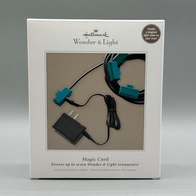 LOT 49: Hallmark Keepsake Tree Ornament Collection w/ Tote & Hallmark Magic Cord Included