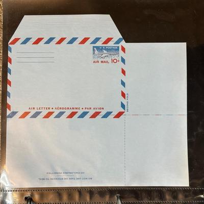 LOT 54: Stamp Collection - Two Albums Full Of Assorted Stamps!