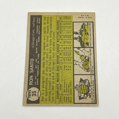 LOT 64: 1960s Baseball Cards - 1961 Ron Santo Rookie and Whitey Ford, 1962 Brooks Robinson and Whitey Herzog, 1965 Don Drysdale and More