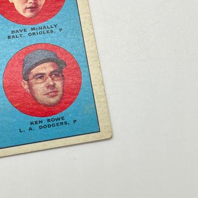 LOT 64: 1960s Baseball Cards - 1961 Ron Santo Rookie and Whitey Ford, 1962 Brooks Robinson and Whitey Herzog, 1965 Don Drysdale and More