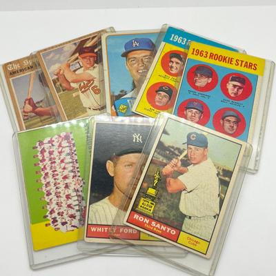 LOT 64: 1960s Baseball Cards - 1961 Ron Santo Rookie and Whitey Ford, 1962 Brooks Robinson and Whitey Herzog, 1965 Don Drysdale and More