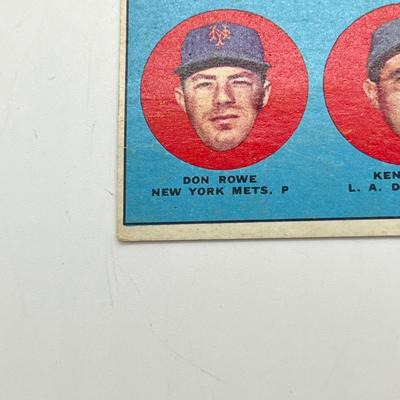 LOT 64: 1960s Baseball Cards - 1961 Ron Santo Rookie and Whitey Ford, 1962 Brooks Robinson and Whitey Herzog, 1965 Don Drysdale and More