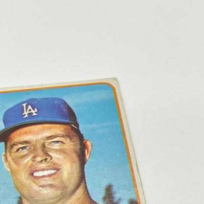 LOT 64: 1960s Baseball Cards - 1961 Ron Santo Rookie and Whitey Ford, 1962 Brooks Robinson and Whitey Herzog, 1965 Don Drysdale and More
