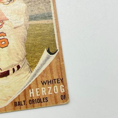 LOT 64: 1960s Baseball Cards - 1961 Ron Santo Rookie and Whitey Ford, 1962 Brooks Robinson and Whitey Herzog, 1965 Don Drysdale and More