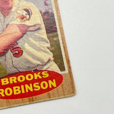 LOT 64: 1960s Baseball Cards - 1961 Ron Santo Rookie and Whitey Ford, 1962 Brooks Robinson and Whitey Herzog, 1965 Don Drysdale and More