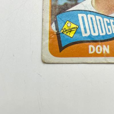 LOT 64: 1960s Baseball Cards - 1961 Ron Santo Rookie and Whitey Ford, 1962 Brooks Robinson and Whitey Herzog, 1965 Don Drysdale and More