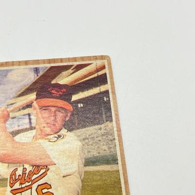 LOT 64: 1960s Baseball Cards - 1961 Ron Santo Rookie and Whitey Ford, 1962 Brooks Robinson and Whitey Herzog, 1965 Don Drysdale and More