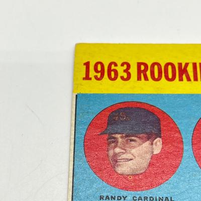 LOT 64: 1960s Baseball Cards - 1961 Ron Santo Rookie and Whitey Ford, 1962 Brooks Robinson and Whitey Herzog, 1965 Don Drysdale and More