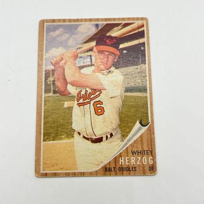 LOT 64: 1960s Baseball Cards - 1961 Ron Santo Rookie and Whitey Ford, 1962 Brooks Robinson and Whitey Herzog, 1965 Don Drysdale and More