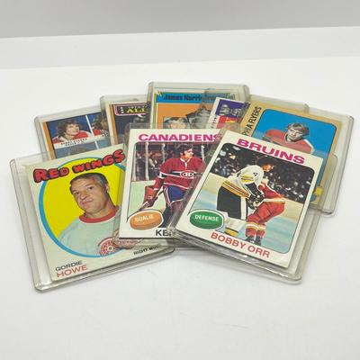 LOT 67: 8 Vintage NHL Cards - Bobby Orr, Gordie Howe, Bobby Clarke, and More