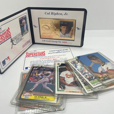 LOT 128: Cal Ripken Baseball Cards and 1996 23K Gold Stamp