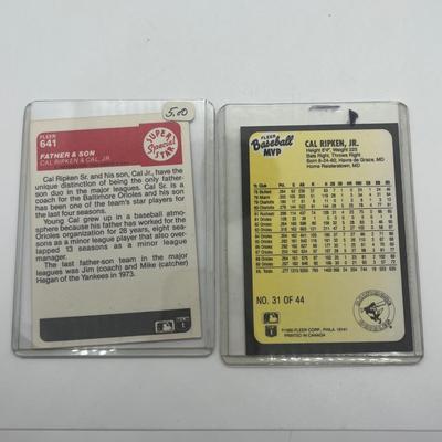 LOT 128: Cal Ripken Baseball Cards and 1996 23K Gold Stamp