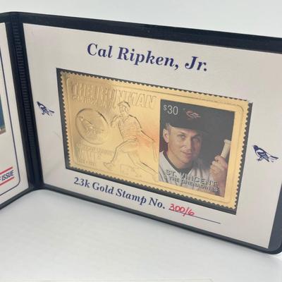 LOT 128: Cal Ripken Baseball Cards and 1996 23K Gold Stamp