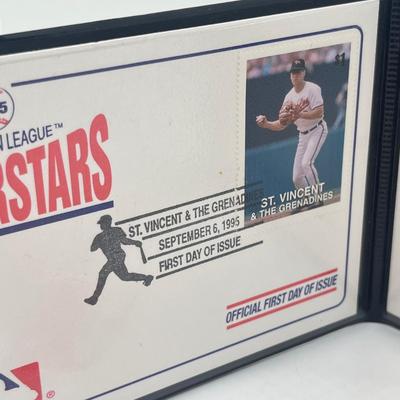 LOT 128: Cal Ripken Baseball Cards and 1996 23K Gold Stamp