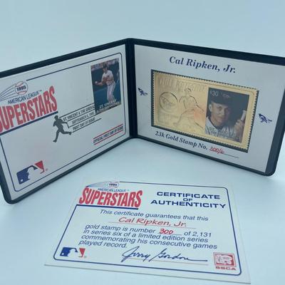 LOT 128: Cal Ripken Baseball Cards and 1996 23K Gold Stamp