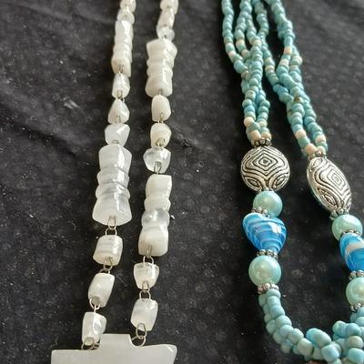 Vintage carved stone tribal totem necklace and Shell necklace