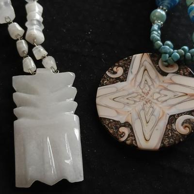 Vintage carved stone tribal totem necklace and Shell necklace