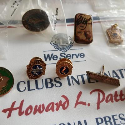 Lions club pins - award pins with International flag banner