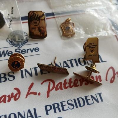Lions club pins - award pins with International flag banner