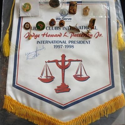 Lions club pins - award pins with International flag banner