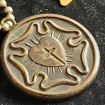 Vintage clasping box with angel pins and vintage Lutheran necklace