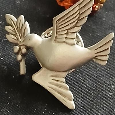 Vintage clasping box with angel pins and vintage Lutheran necklace