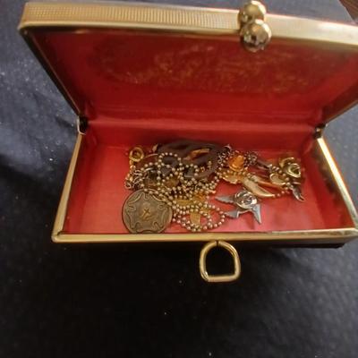 Vintage clasping box with angel pins and vintage Lutheran necklace