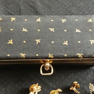 Vintage clasping box with angel pins and vintage Lutheran necklace