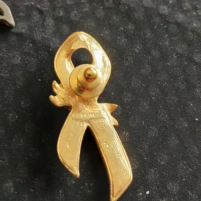 Vintage clasping box with angel pins and vintage Lutheran necklace