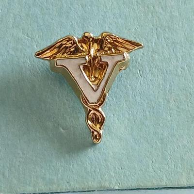 Award pins and a Cross Country 1954 10K GF necklace