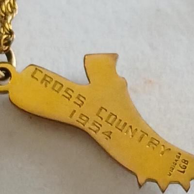 Award pins and a Cross Country 1954 10K GF necklace