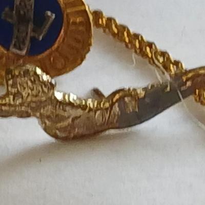 Award pins and a Cross Country 1954 10K GF necklace