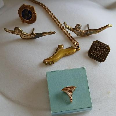 Award pins and a Cross Country 1954 10K GF necklace