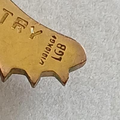 Award pins and a Cross Country 1954 10K GF necklace