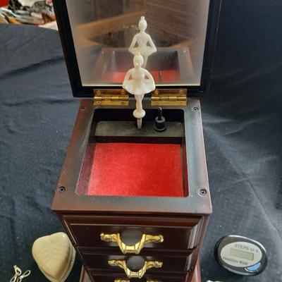 Musical jewelry box with ballerina girl and an assortment of Jewler, book marker and more