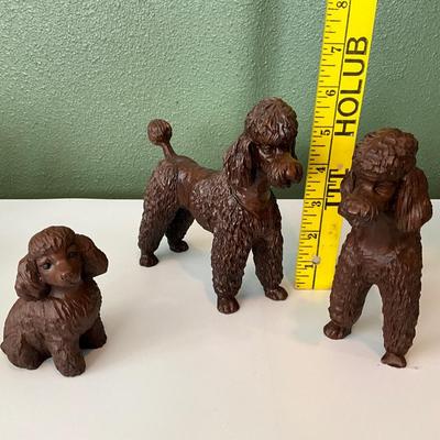 Hand carved wood Poodles
