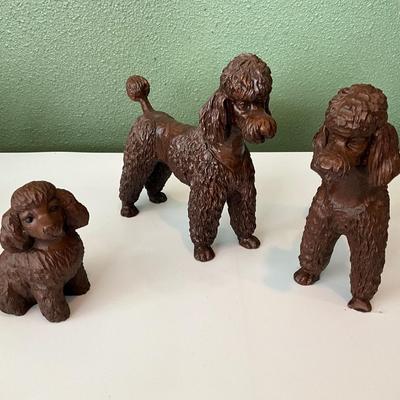 Hand carved wood Poodles