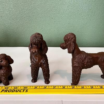 Hand carved wood Poodles