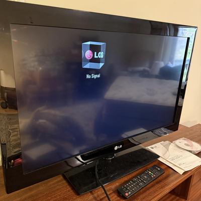 32” LG TV with Remote and Surge Protector (GB-BM)