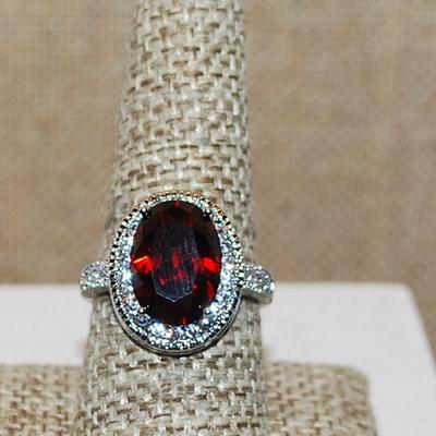 Size 8 ½ Large Cranberry RED Oval Stone Ring on Oval Ring Setting on a Silver Tone Band (5.0g)